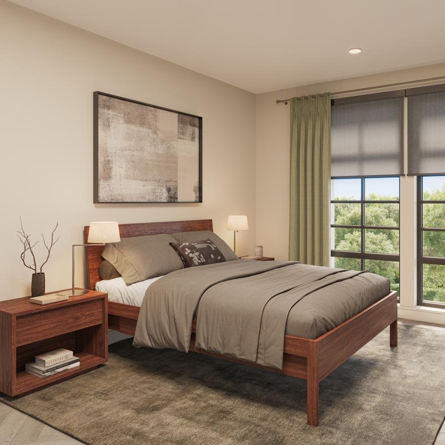 a bedroom with a large window