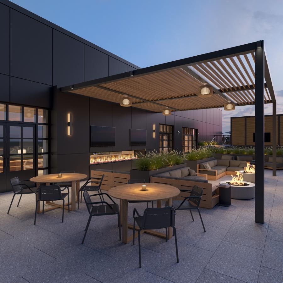 a patio with tables and chairs outside