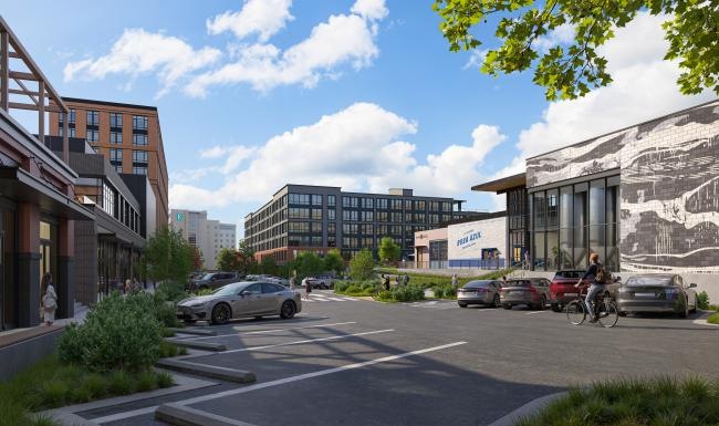 a street with cars and buildings