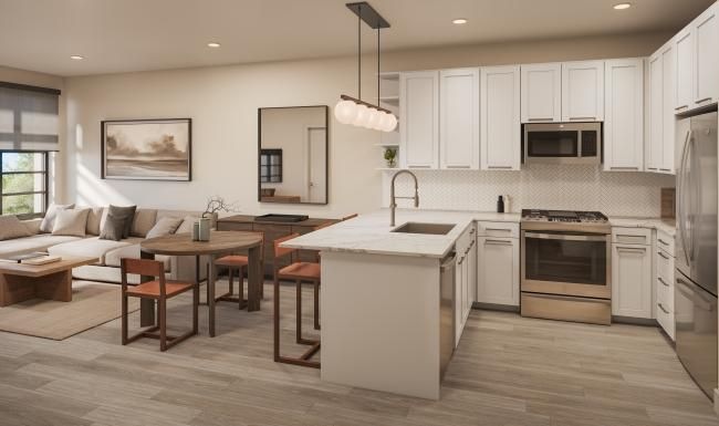 a kitchen with white cabinets