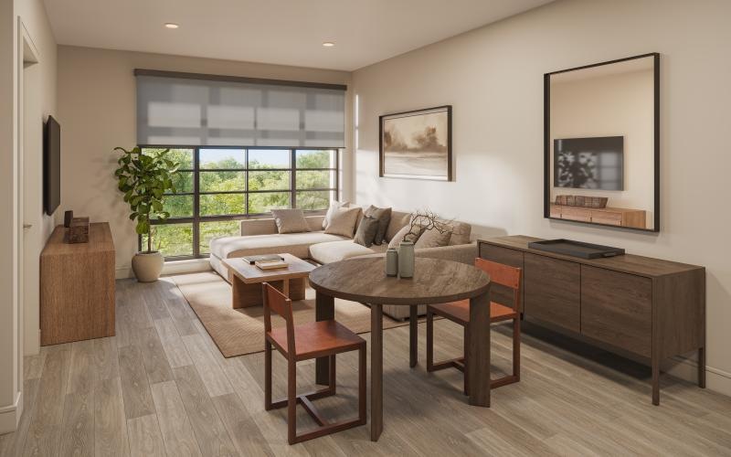 a living room with a couch and a table